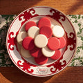 Christmas Sherbet Mints in red and white on a Lammes Candies holiday plate